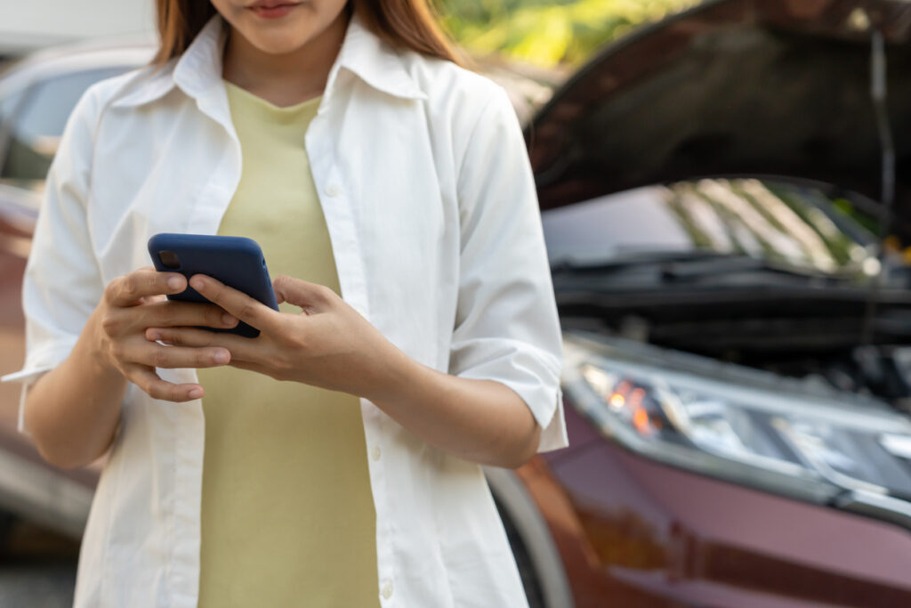 Woman uses social media on phone